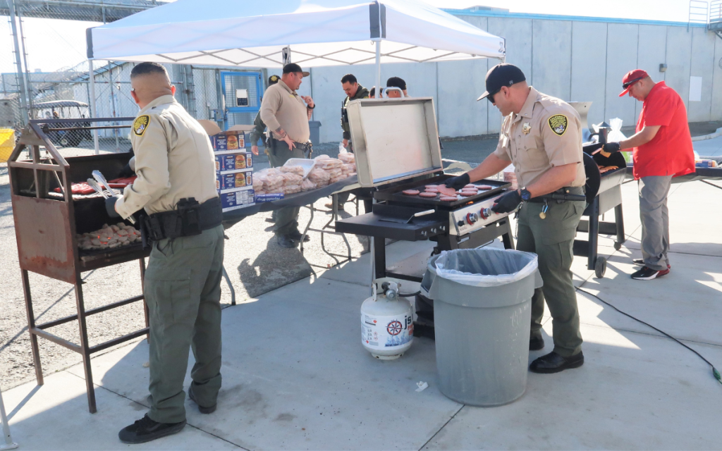 Corcoran prison staff grill burgers and hotdogs as a Superbowl staff appreciation event Feb. 7.